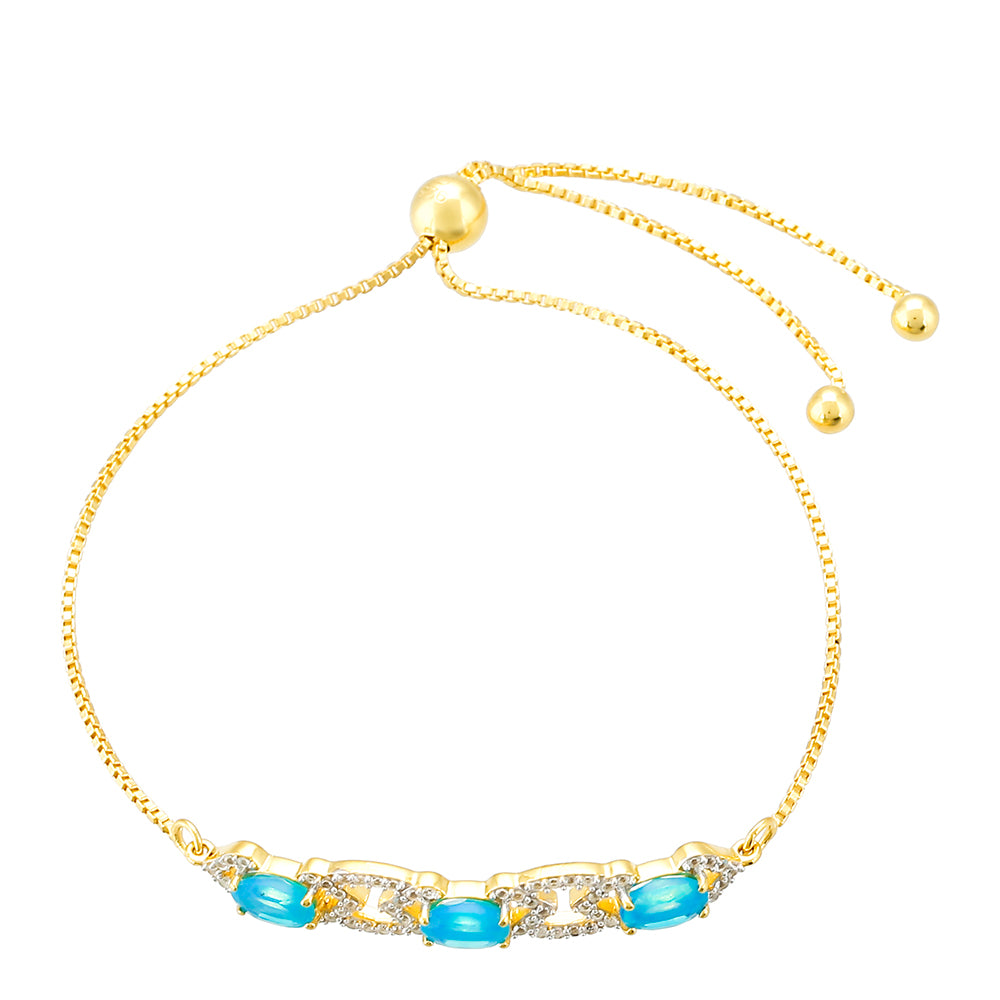Pulseira de Prata com Banho de Ouro com Opala Azul Paraib da Etiópia e Topázio Branco Contraste: Cabeca de Veado (800)