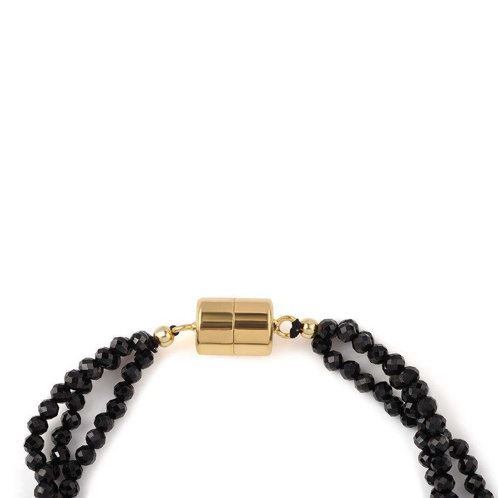 Pulseira de Prata com Banho de Ouro com Espinela Preta e Pérola de Água Doce Branca Contraste: Cabeca de Veado (800)