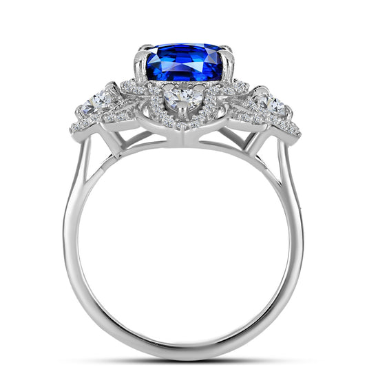 Anel de Prata com Safira Azul Australiana e Topázio Branco Contraste: Cabeca de Veado (800)