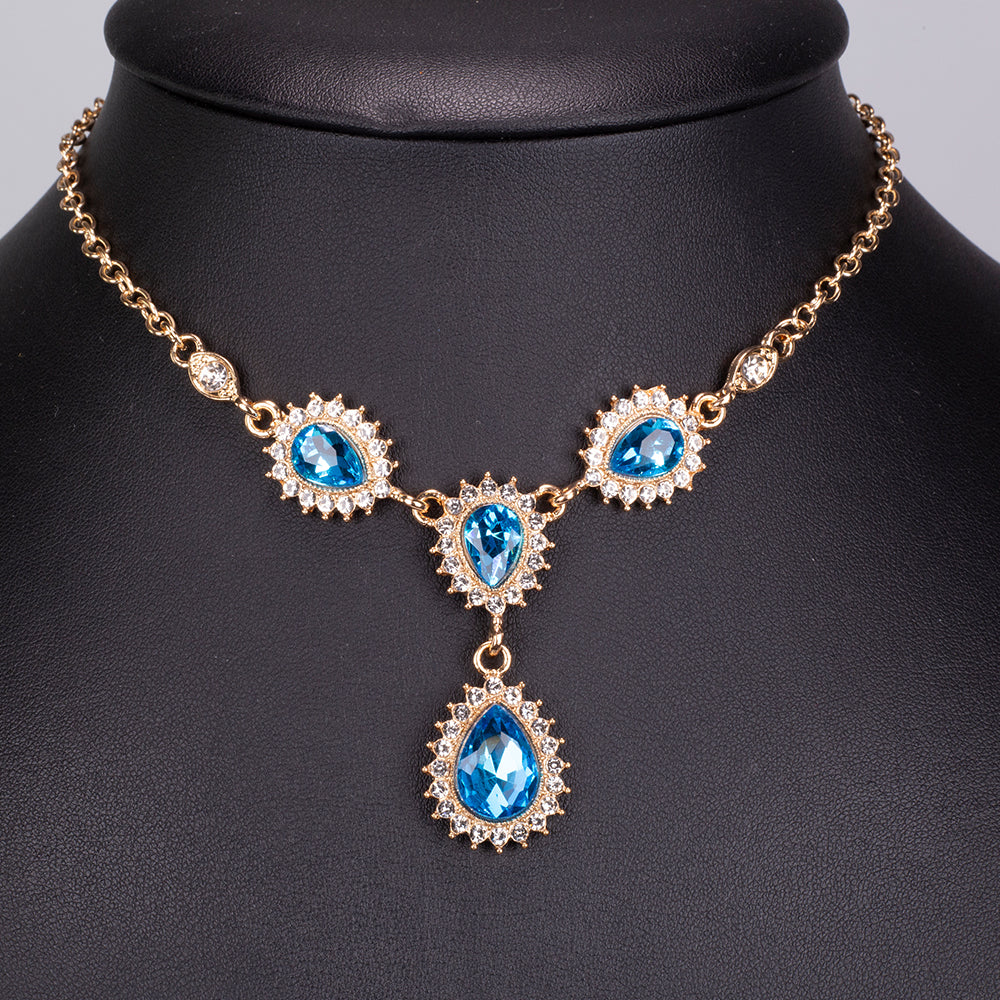 Conjunto de Liga de Ouro com Cristal Emporia® Azul e Cristal Emporia® Branco ( Colar+Brincos+Pulseira )