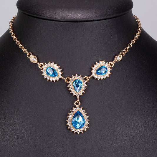 Conjunto de Liga de Ouro com Cristal Emporia® Azul e Cristal Emporia® Branco ( Colar+Brincos+Pulseira )