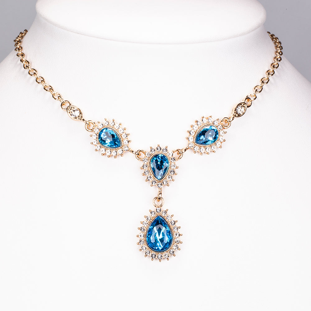 Conjunto de Liga de Ouro com Cristal Emporia® Azul e Cristal Emporia® Branco ( Colar+Brincos+Pulseira )