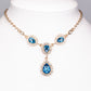 Conjunto de Liga de Ouro com Cristal Emporia® Azul e Cristal Emporia® Branco ( Colar+Brincos+Pulseira )