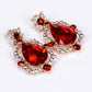 Conjunto de Liga de Ouro com Cristal Emporia® Vermelho e Cristal Emporia® Branco ( Colar+Brincos )