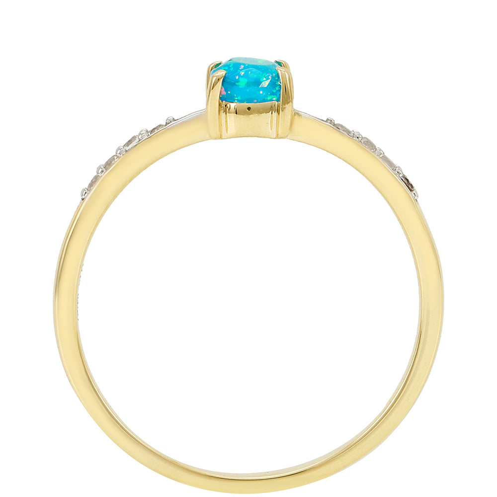 Anel de Ouro com Opala Azul Paraib da Etiópia e Topázio Branco  Contraste: Cruz missionária