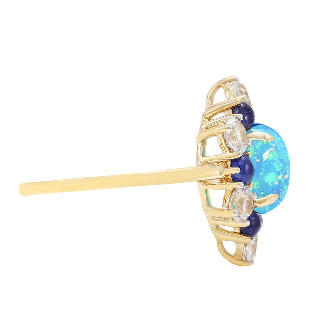 Anel de Ouro com Opala Azul Paraib da Etiópia e Safira Azul  Contraste: Cruz missionária