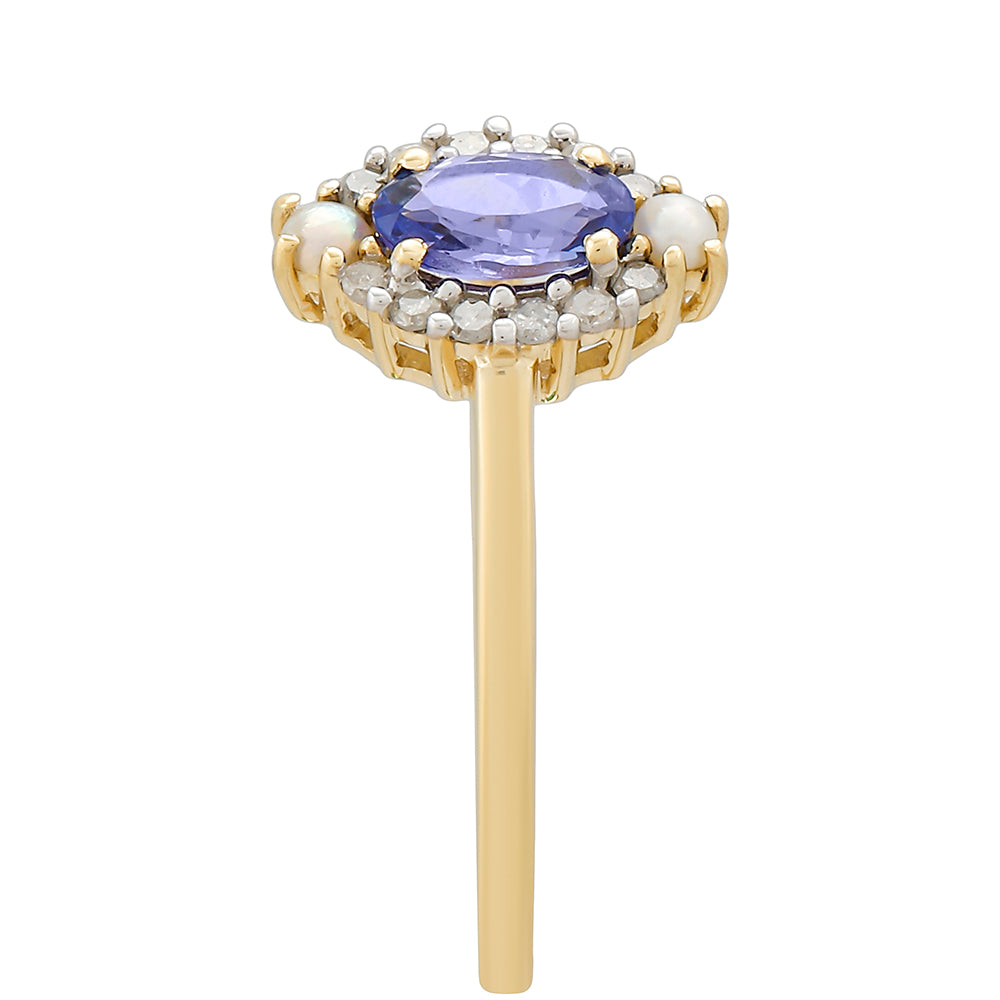 Anel de Ouro com Tanzanite e Diamante Branco  Contraste: Cruz missionária