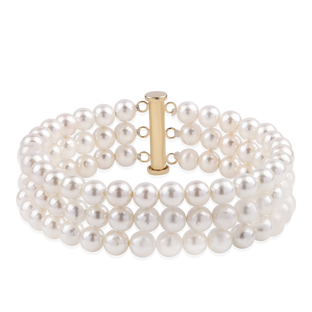 Pulseira de Ouro com Pérola de Água Doce Branca  Contraste: Cruz missionária