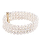 Pulseira de Ouro com Pérola de Água Doce Branca  Contraste: Cruz missionária
