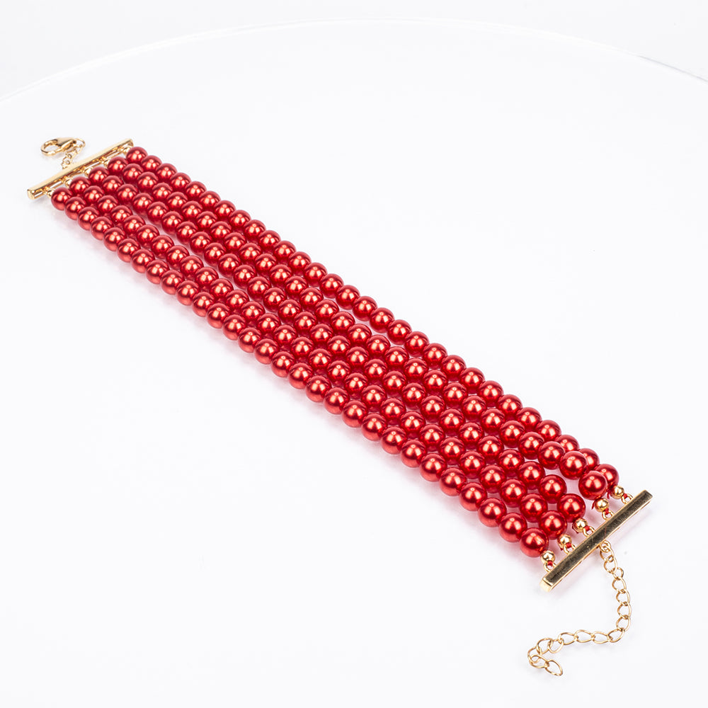 Pulseira de Prata com Banho de Ouro com Pérola Vermelha de Água Doce  Contraste: Cabeca de Veado (800)