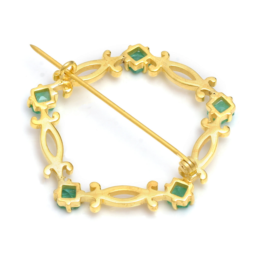 Alfinete de Prata com Banho de Ouro com Esmeralda do Brasil  Contraste: Cabeca de Veado (800)