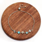 Pulseira de Prata com Apatita Azul do Madagáscar e Topázio Branco  Contraste: Cabeca de Veado (800)
