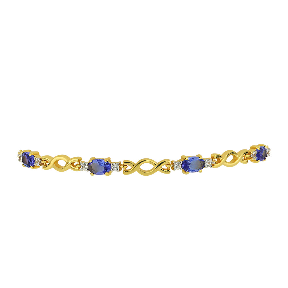 Pulseira de Ouro com Tanzanite AAA e Zircão Branco Natural  Contraste: Cruz missionária