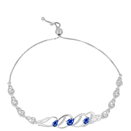 Pulseira de Prata com Safira Azul Australiana e Topázio Branco  Contraste: Cabeca de Veado (800)