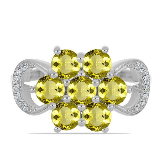 Anel de Prata com Topázio Cor de Limão e Topázio Branco  Contraste: Cabeca de Veado (800)