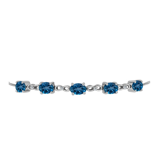Pulseira de Prata com Topázio Azul de Londres e Topázio Branco  Contraste: Cabeca de Veado (800)