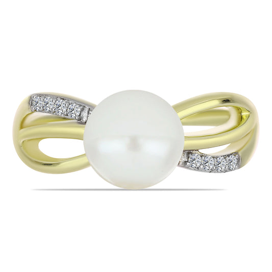 Anel de Prata com Banho de Ouro com Pérola de Água Doce Branca e Topázio Branco  Contraste: Cabeca de Veado (800)