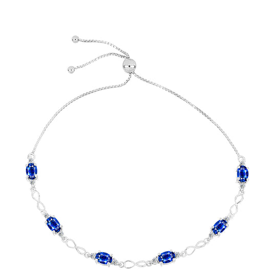 Pulseira de Prata com Safira Azul Australiana e Topázio Branco  Contraste: Cabeca de Veado (800)