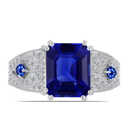 Anel de Prata com Safira Azul Australiana e Topázio Branco  Contraste: Cabeca de Veado (800)