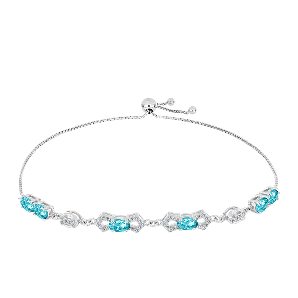 Pulseira de Prata com Quartzo de Paraíba e Topázio Branco  Contraste: Cabeca de Veado (800)