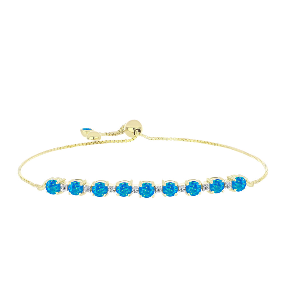 Pulseira de Prata com Banho de Ouro com Opala Azul Paraib da Etiópia e Topázio Branco  Contraste: Cabeca de Veado (800)