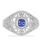 Anel de Prata com Tanzanite e Topázio Branco  Contraste: Cabeca de Veado (800)
