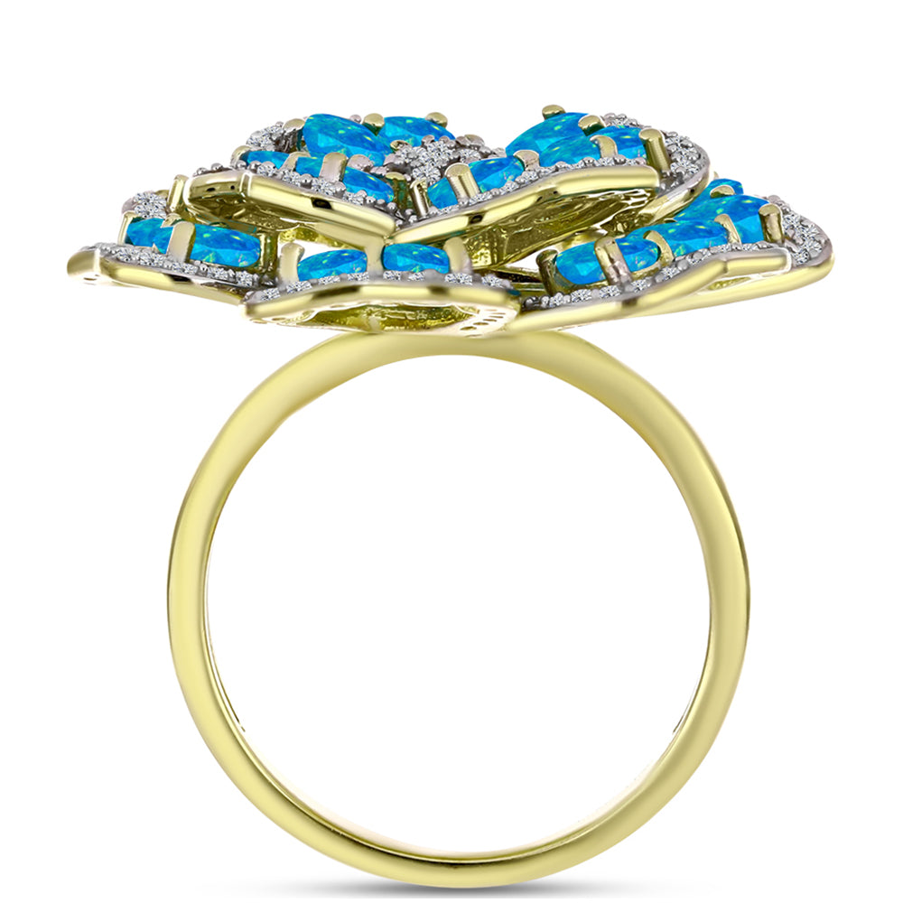 Anel de Prata com Banho de Ouro com Opala Azul Paraib da Etiópia e Topázio Branco  Contraste: Cabeca de Veado (800)