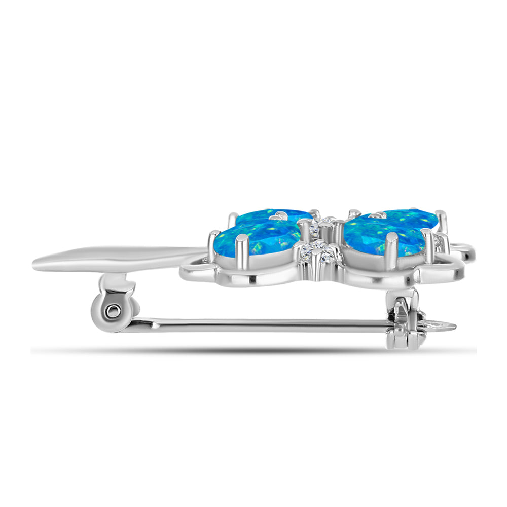 Alfinete de Prata com Opala Azul Paraib da Etiópia e Topázio Branco  Contraste: Cabeca de Veado (800)