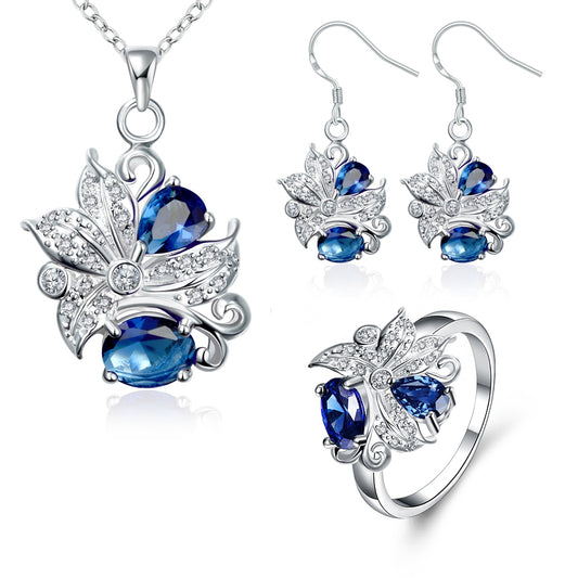 Conjunto de Liga de Ouro com Cristal Emporia® Azul ( Colar+Brincos+Anel )